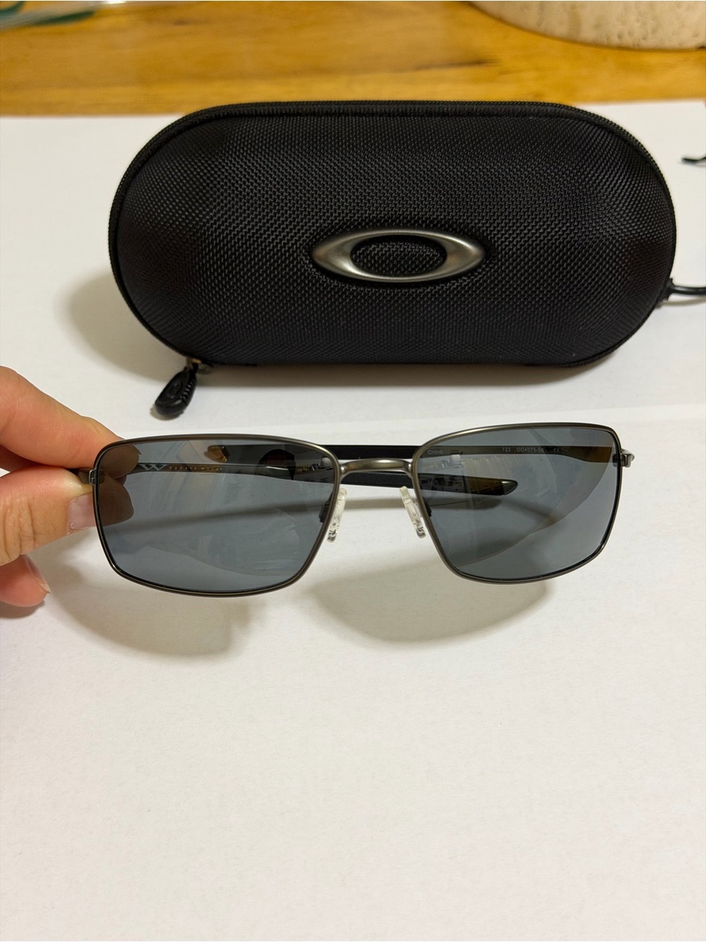 Oakley Men’s Black Metal Rectangular Sunglasses with Gray Lenses